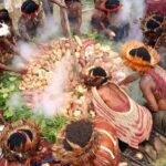 Tradisi Bakari Batu di Papua